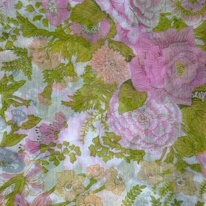 Vibrant Floral Fabric with Pink and Green Hues